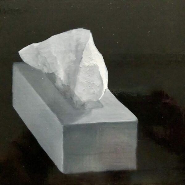 Tissue is bursting from a box of kleenex asking to be taken!