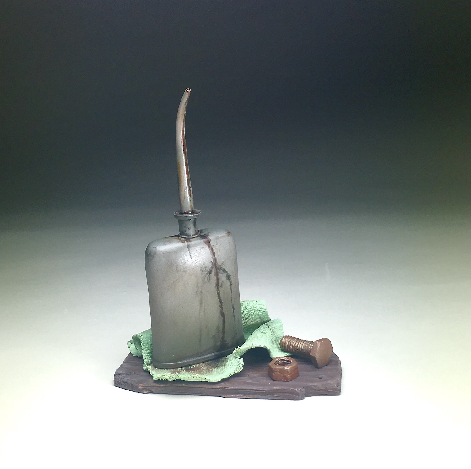 PETITE OILER ON A GREEN RAG